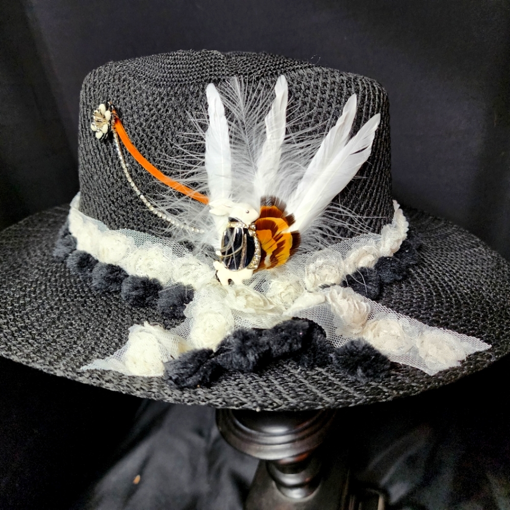 Black mesh decorated hat